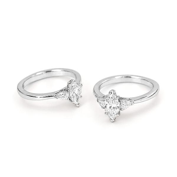Image of 0.60ct Natural Marquise Brilliant Cut Diamond with Natural Pear Brilliant Cut Diamond Outers Ring in Platinum