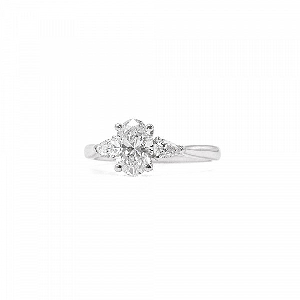Image of 1.15ct Natural Oval Brilliant Cut Diamond Trilogy Set with Plain Shoulders Ring in Platinum