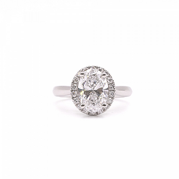 Image of 0.90ct Natural Oval Brilliant Cut Diamond with Natural Diamond Halo and Plain Shoulders Ring in Platinum