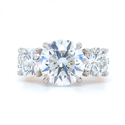 Round Brilliant Trilogy Set with Diamond Set Shoulders Trilogy Ring Metal Image